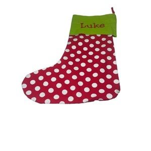 NWOT RED AND WHITE POKA DOT CHRISTMAS STOCKING WITH THE NAME “LUKE”EMBROIDERED